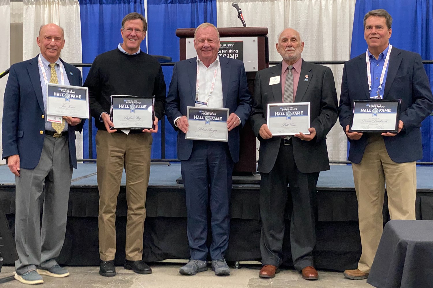 Jim Jones (left) stands with other hall of fame inductees at the 2021 SUR/FIN conference in Detroit, MI.